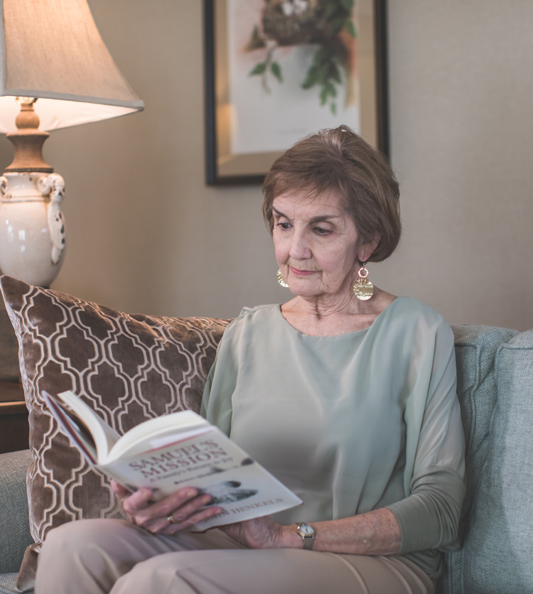 senior woman reading book